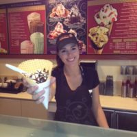 Cold Stone Creamery franchise employee with ice cream